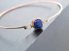 Lapis Lazuli Rose Gold Bracelet Bezel Style Wire by SaressaDesigns Elegant Hammered Rose Gold Bracelets, Adjustable Hammered Rose Gold Bangle, Elegant Hammered Rose Gold Jewelry, Rose Gold Gemstone Bangle Jewelry, Elegant Rose Gold Hand Wrapped Jewelry, Minimalist Hand Wrapped Rose Gold Jewelry, Minimalist Hand-wrapped Rose Gold Jewelry, Wire Wrapped Rose Gold Bracelet, Rose Gold Wire Wrapped Bracelet