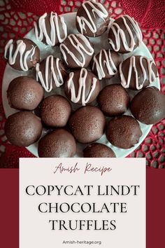 chocolate truffles with white frosting on top and the words copycat lindt chocolate truffles