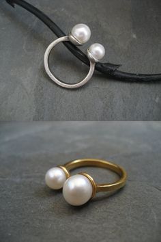 This ring was hand carved out of wax and cast in solid .925 sterling silver, followed by a 18k gold plating. On top are 2 genuine cultured pearls that are nestled in a cup. The larger pearl measures approx. 8mm the smaller one 6.5mm. Please note that size and color may slightly vary, since these are natural pearls. Available in sterling silver and 18k gold plating over sterling silver. Please choose from the drop down list at checkout. Solid 14k gold available upon request ==&#x... Unique Pearl Jewelry For Anniversary, Elegant Hand-cast Jewelry, Sterling Silver Pearl Drop Ring, Elegant Hand Cast Jewelry For Anniversary, Handmade Gold Pearl Ring In Sterling Silver, Elegant Hand Cast Open Ring Jewelry, Elegant Hand-cast Open Ring Jewelry, Elegant Hand Forged Open Ring Jewelry, Gold Sterling Silver Pearl Ring For Formal Occasions