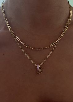 The Milestone Collection.Make a subtle statement with this pink sapphire charm—handcrafted and made to honor your modern milestones. Layer with our Love Letter Charm. 14k solid gold—always Weight: 0.6g Width: 2.5mm Inner diameter: 4.7mm Total diameter: 9.3mm Total carat weight: 0.48ctw Chain sold separately Fall Rings, Letter Charm, Ring Sizer, Letter Charms, Love Letter, Chain Link Necklace, Pink Sapphire, Love Letters, Milestones