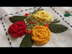 a close up of a piece of cloth with flowers on it