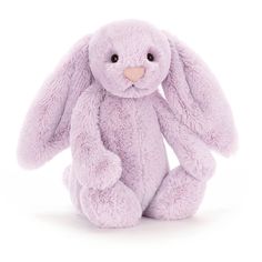 a pink bunny stuffed animal on a white background