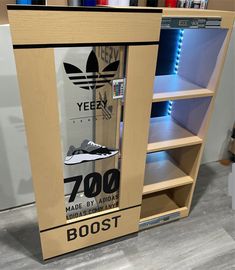 a display case for adidas shoes in a store