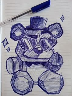 a drawing of some kind of cubes on a piece of paper with a pen next to it