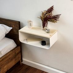 Dimensions: Length: 18" | 46 cm Width: 13.7" | 35 cm Depth: 8.6" | 22 cm Minimalistic Design: The floating nightstand features a sleek and minimalist design, providing a simple yet stylish addition to any bedroom décor. Space-Saving Solution: Without shelves, the floating nightstand takes up minimal space, making it ideal for small bedrooms or those who prefer a clutter-free environment. Easy Installation: The nightstand is designed for easy installation, with included hardware and instructions Minimalist Bedside Table, Minimalist Nightstand, Walnut Bedside Table, Floating Bedside Table, Cottage Apartment, Metal Nightstand, Wall Mounted Shelf, Bedside Shelf, Bedside Essentials