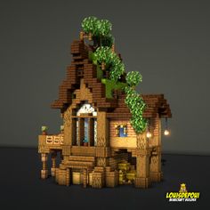 a house made out of legos with trees on the roof