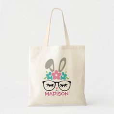 a tote bag with glasses and flowers on it that says,'madison '