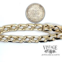 This 8 inch, 8.3mm wide, 14 karat yellow gold bracelet is made with a beautiful curb link design. Crafted with precision, this bracelet showcases the highest quality gold for a timeless accessory you can wear for years to come. It is secured with an integrated box catch and figure 8 safety. 14 karat yellow gold 8" length 8.3 mm width Classic Cuban Link Bracelet, Tarnish Resistant, Classic Cuban Link Chain Bracelet, 14k Yellow Gold Cuban Link Necklace With Oval Links, Classic Cuban Link Bracelet With Oval Links, 14k Gold Curb Chain Link Bracelet, Classic Gold Cuban Link Chain Bracelet, 14k Gold Oval Link Curb Chain Bracelet, Classic 14k Gold Cuban Link Chain Bracelet, Yellow Gold Curb Chain Bracelet With Rectangular Links