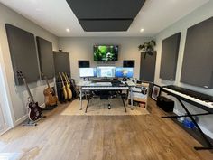 a room filled with musical instruments and sound equipment