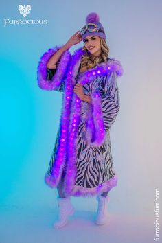 Bring the festival vibes to life with our Women's LED light-up kimono. Perfect for festival outfits, burning man fashion, and overall festival aesthetic. Stand out in the crowd with this unique piece that combines luxury and high-quality craftsmanship.  SHOP NOW! @ furrociousfurr.com | LED kimono | festival outfit | burning man fashion Kimono Festival Outfit, Fur Kimono, Festival Outfit Inspiration, Festival Aesthetic, Sequin Kimono