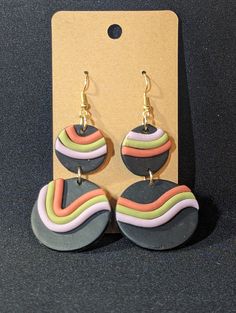 Handmade clay earrings Trendy Handmade Clay Jewelry, Hand Painted Clay Earrings For Everyday Wear, Handmade Artsy Clay Earrings, Handmade Clay Dangle Earrings, Hand Painted Round Polymer Clay Earrings, Multicolor Clay Dangle Jewelry, Round Polymer Clay Earrings With Ear Wire, Trendy Everyday Clay Earrings, Handmade Multicolor Clay Earrings