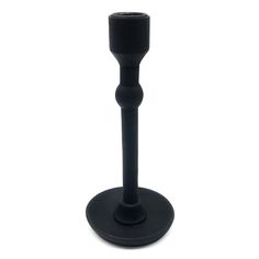 a black candle holder on a white background