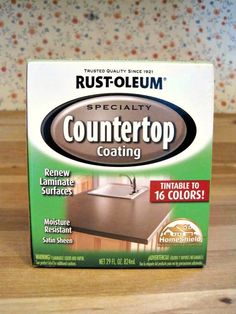 a box of countertop coating sitting on top of a wooden table