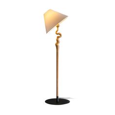 a floor lamp with a white shade on the top and a black base, in front of a white background