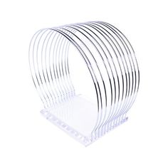 a stack of clear plastic rings on a white background