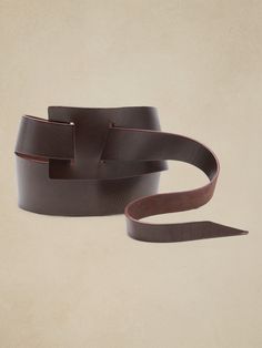 Effortlessly cool and distinctive, we pulled inspiration from the archives to craft this versatile leather belt using a pull-through design to cinch in at the waist.  A tapered design streamlines the draped ends.  Widest width: 3" (8cm) Narrowest wid Winter Work Attire, Women's Belts, Winter Work, Fall 23, Belt Leather, Family Event, Pull Through, Work Wardrobe, Work Attire