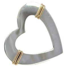 Authentic Tiffany & Co Estate Heart Brooch Pin 18k Y Gold Sterling Silver TIF675 TRUSTED SELLER SINCE 2002 PLEASE SEE OUR HUNDREDS OF POSITIVE FEEDBACKS FROM OUR CLIENTS!! FREE SHIPPING Shape: Heart Brooch Weight: 4.5 Grams Material: 18k Yellow Gold + Sterling Silver "Embrace timeless elegance with this exquisite sterling silver brooch from the iconic Tiffany & Co. Renowned for its craftsmanship and classic designs, this brooch exemplifies the luxury and sophistication that Tiffany & Co. is cele Tiffany Setting, Tiffany Diamond, Sterling Silver Brooch, Gilded Age, Heart Brooch, Tiffany And Co, Silver Brooch, Fine Jewelry Designers, Silver Pieces