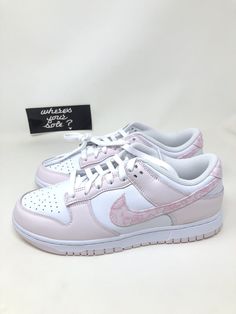 100% authentic products, guaranteed.  We DO NOT sell fakes, variants or b-grades.  Only purchased from authorized retailers.  Bid with confidence, check out our 100% feedback Item Description Name:  Nike Dunk Low Essential Paisley Pack Pink Style number: FD1449-100 Condition: Brand New w/ box and tissue paper (deadstock)  Size:  women's 10.5 // men 9 Shipping and Handling Domestic ? Shipped as soon as payment is received.  Double boxed shipped and tracking to eBay verified address only. Automati Swaggy Shoes, Preppy Shoes, Cute Nike Shoes, Nikes Girl, Cute Nikes, Pink Paisley, Pink Style, Nike Fashion, Nike Dunk Low