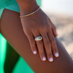 This stunning 14k pave diamond dome ring features a captivating oval mint tourmaline at its center. This exquisite ring boasts a dome-shaped design adorned with a multitude of small, meticulously set diamonds, creating a breathtaking sparkle from every angle. The center oval mint tourmaline gemstone adds a touch of unique elegance and natural beauty. Mint tourmaline is often associated with fresh energy and renewal and is believed to bring a sense of vitality, rejuvenation, and new beginnings. S Fine Jewelry Oval Dome Ring With Pave Setting, Oval Dome Ring With Pave Setting, Oval Dome Ring With Pave Setting In Fine Jewelry, Fine Jewelry Oval Dome Ring With Diamond Accents, Oval Dome Ring With Diamond Accents, Oval Dome Ring With Diamond Accents, Fine Jewelry, Dome Ring, Pave Ring, Domed Ring