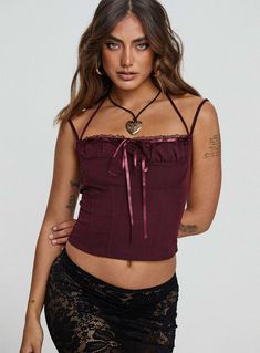 Trynia Top Burgundy Stretch Spaghetti Strap Top With Corset Back, Stretch Cami Halter Top With Tie Back, Fitted Halter Top With Adjustable Straps, Party Halter Neck Tank Top With Adjustable Straps, Halter Neck Tank Top With Adjustable Straps For Party, Party Tank Top With Adjustable Halter Neck Straps, Fitted Strappy Halter Top With Tie Straps, Halter Neck Camisole With Adjustable Straps, Halter Neck Top With Adjustable Straps For Party