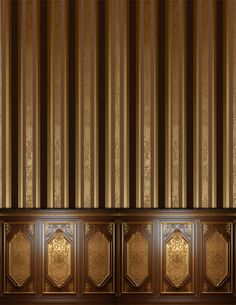 an empty room with wooden paneling and gold wallpaper