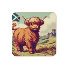 a scottish highland cow standing in the grass with a flag on it's back