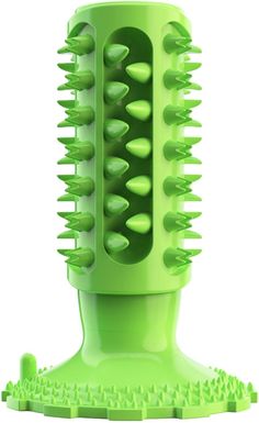 a green hair brush with spikes on it