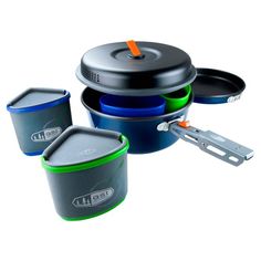 an image of camping pots and pans set up