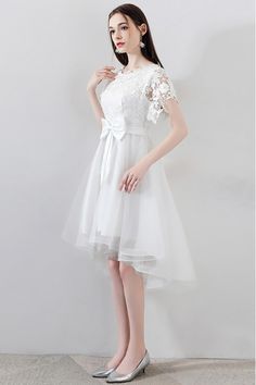 Gorgeous White Tulle Homecoming Dress High Low with Big Bow - $71.1 #MXL86059 - SheProm.com Wedding Mini Dress With Short Sleeves, Short Sleeve Mini Dress For Wedding, White Lace Dress With Short Sleeves, White Knee-length Mini Dress For Wedding, White Lace Short Sleeve Dress, White Lace Mini Dress With Short Sleeves, White Mini Dress With Short Sleeves For Wedding, White Lace Short Sleeve Wedding Dress, White Short Sleeve Lace Wedding Dress