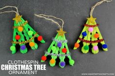 three christmas tree ornaments made out of popsicle sticks with pom - poms