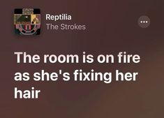 the room is on fire as she's fixing her hair