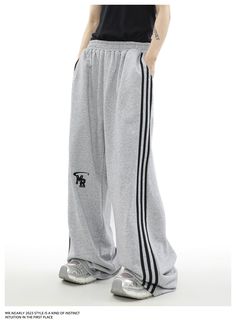 Urban Edge Athleisure Tracksuit - chiclara Baggy Tracksuit Pants, Casual Relaxed Fit Sweatpants With Three Stripes, Casual Gray Tracksuit For Loungewear, Gray Athleisure Tracksuit For Leisure, Gray Cotton Tracksuit For Leisure, Adidas Relaxed Fit Joggers For Streetwear, Three Stripes Branding Relaxed Fit Joggers For Streetwear, Sporty Sweatpants With Three Stripes For Loungewear, Gray Relaxed Fit Casual Tracksuit