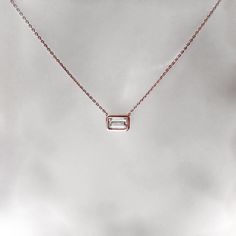 A customer favorite and back in stock for the holidays, my signature .20 ct Emerald cut diamond necklace. ---------------D E T A I L S--------------- - . 20 ct emerald cut diamond, G SI+, 4 mm x 3 mm - Set in a 14k gold bezel setting - Available in 14k white, yellow or rose gold - Sizes 15 - 20 inches *18k gold and custom lengths available upon request Emerald Cut Single Diamond Necklace Gift, Anniversary Solitaire Necklace With Baguette Diamonds, Emerald Cut Diamond Necklace With Accents As Gift, Anniversary Baguette Diamond Solitaire Necklace, Diamond Solitaire Necklace With Baguette Diamonds For Anniversary, Emerald Cut Diamond White Diamond Necklace Gift, Emerald Cut Single Diamond Necklace For Gifting, Emerald Cut Diamond White Necklace Gift, Emerald Cut Diamond Necklace For Gift