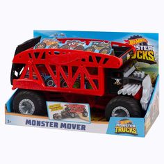 a red monster truck in a cardboard box