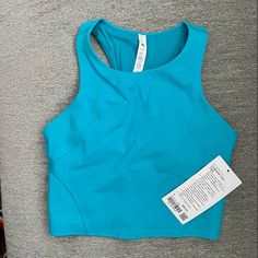 Nwt Lululemon Invigorate Training Tank Top Turquoise Tide 6 Turquoise Stretch Activewear For Sports, Turquoise Athleisure Activewear For Workout, Turquoise Sporty Activewear, Turquoise Sporty Activewear For Sports, Lulu Tops, Cute Lululemon Outfits, Lululemon Outfit, Lulu Outfits, Lululemon Outfits