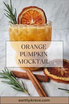 an orange pumpkin cocktail with cinnamon and rosemary garnish