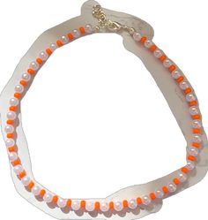 Orange Beads As A Gift, Orange Beaded Necklaces As Gift, Orange Choker With Colorful Beads, Adjustable Orange Choker With Round Beads, Orange Choker Necklace For Gift, Casual Orange Beaded Necklaces For Gifts, Handmade Orange Beaded Casual Necklace, Orange Beaded Choker With Round Beads, Trendy Orange Jewelry With Colorful Beads