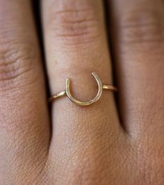 This "Lucky Horseshoe" ring is made using 18 gauge wire that is hand formed and hammered, and measures approx 9mm across. The band is 16 gauge hammered wire that fits comfortable alone or stacking. Available in your ring size in two toned metal choice- sterling horseshoe with a yellow gold band, yellow gold horseshoe with sterling band, rose gold horseshoe with silver band, or silver horseshoe with rose gold band. This ring is a part of "The Ranch Collection": A classic, American collection insp Equestrian Ring, Horseshoe Ring, Special Symbols, Lucky Horseshoe, Hammered Silver, Classic American, The Ranch, Recycled Sterling Silver