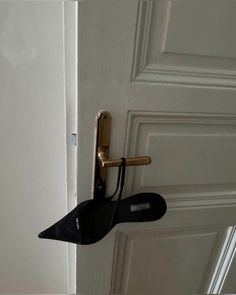 an umbrella is hanging on the door handle