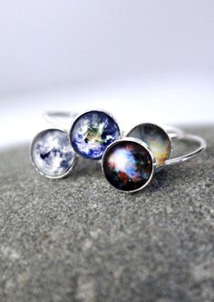 "A sterling silver galaxy ring made with the celestial image of your choosing from available options. This is a simple and clean 100% sterling silver celestial stacking ring custom made in your size with an image from our Universe under glass. Please see our image selections to see what bit of the cosmos your ring can feature! Makes a wonderful gift for any science fashionista or lover of outer space. Ring size: Made to order in your size - please select Image size: 3/8\" (8mm) Materials: Sterli Space Ring, Space Rings, Photo Ring, Galaxy Ring, Space Jewelry, Fake Jewelry, Celestial Jewelry, Shiny Things, Etsy Jewelry