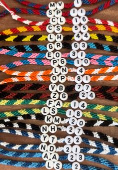 several bracelets that have numbers on them