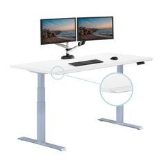 a computer desk with two monitors sitting on it's sides, and an image of the