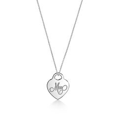 Inspired by archival Tiffany price tags, this sterling silver pendant necklace features a heart-shaped charm engraved with the word “mom.” It makes a beautiful gift for mothers and mother figures. Sterling silver; Motif size, medium; On a 16" chain | Mom Medium Heart Tag Pendant in Sterling Silver Tiffany And Co Heart Tag Necklace, Bridal Jewelry Necklace, Heart Tag, Price Tags, Sterling Silver Necklace Pendants, Gift Guides, Silver Pendant Necklace, Sterling Silver Pendant, Tiffany & Co.