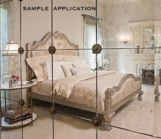 a bedroom with mirrored walls and a bed