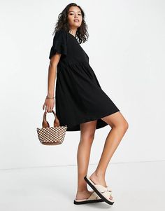 River Island frill tiered smock mini dress in black | ASOS Black Tiered Dress For Spring, Black Tiered Mini Dress With Ruffle Hem, Black Tiered Dress With Ruffle Hem For Spring, Casual Mini Dress With Ruffles For Work, Black Casual Tiered Dress With Ruffles, Casual Black Summer Tiered Dress, Casual Black Tiered Summer Dress, Chic Mini-length Tiered Daywear Dress, Chic Mini Length Tiered Dress For Daywear