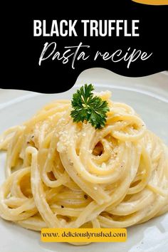 black truffle pasta recipe on a white plate with parsley garnish