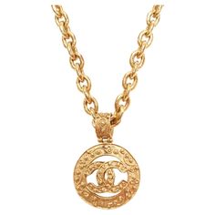 CHANEL 94A Vintage gold tone interlock CC logo coin pendant chain necklace Reference: TGAS/D00163 Brand: Chanel Designer: Karl Lagerfeld Collection: 94A Material: Metal Color: Gold Pattern: Solid Closure: Lobster Clasp Made in: France CONDITION: Condition: Excellent, this item was pre-owned and is in excellent condition. Comes with: Style code present (Generic) One dust bag. Designer box. This Chanel item is authentic. Necklace Reference, Chanel Designer, Gold Pattern, Cc Logo, Coin Pendant, Karl Lagerfeld, Vintage Gold, Jewelry Necklace Pendant, Dust Bag