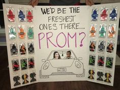 a person holding up a sign that says, we'd be the freshest ones there prom?