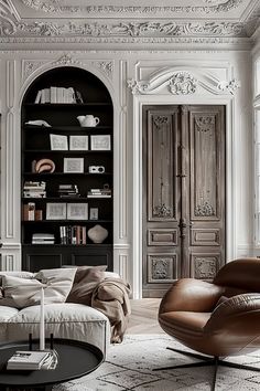 a living room filled with furniture and bookshelves