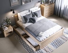 a large bed sitting on top of a wooden frame